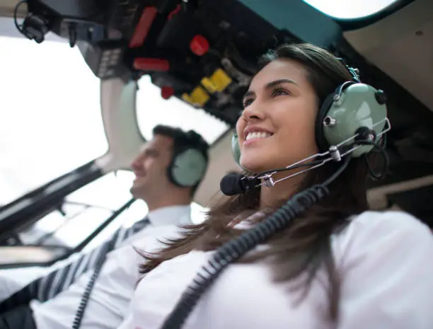 Photo of Woman flying a helicopter