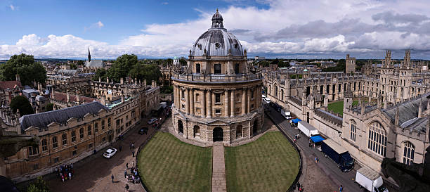 Oxford, UK Oxford, England - August 10, 2014: Panoramic view of Radcliffe Square in the British city of Oxford. We can see in the foreground the Radcliffe Camera, and sides, Lincoln College, the Bodleian library, Hertford College and All Souls College radcliffe camera stock pictures, royalty-free photos & images