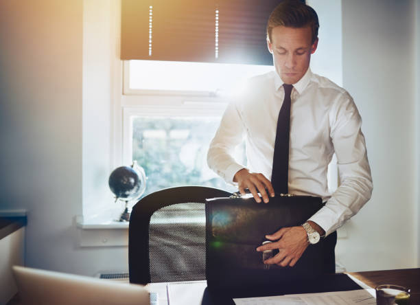 istock Business man with briefcase at office 506503872