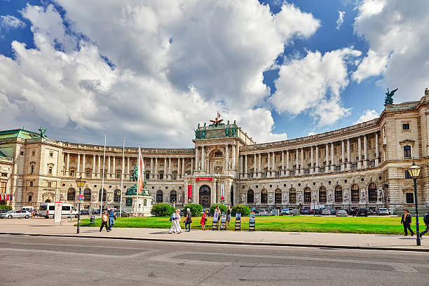 Hofburg Palace . Austria Vienna, Austria- September 10, 2015:  Peoples near Hofburg Palace .Austrian National Library is the largest library in Austria, with 7.4 million items in its various collections.Austria heldenplatz stock pictures, royalty-free photos & images