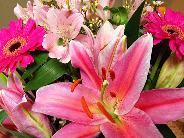 istock Pink Lily and Gerbera Flower Arrangement 506507400