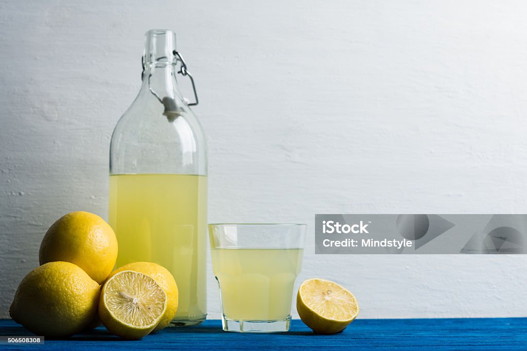 Limoncello. Tradtitional italian beverage. Limoncello. Tradtitional italian homemade lemon beverage. Alcohol - Drink Stock Photo