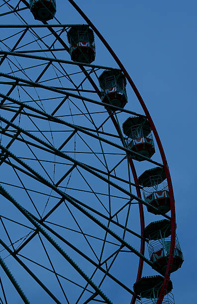 istock Simple ferris wheel in black and blue 506510822