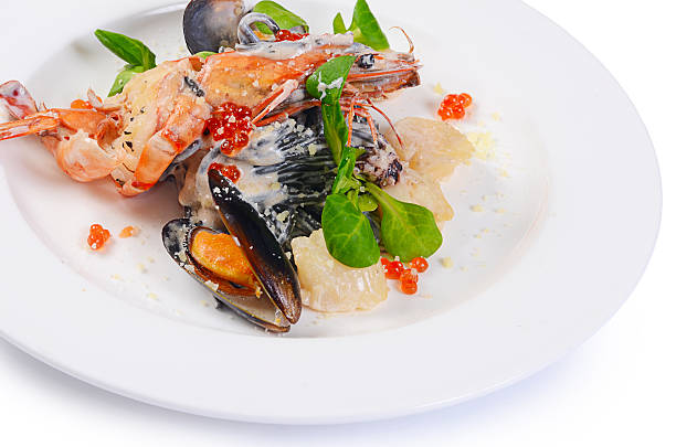 istock The black spaghetti with seafood closeup 506511724