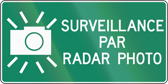 Canadian road sign - Surveillance by radar photo/radar trap. This sign is used in Quebec.