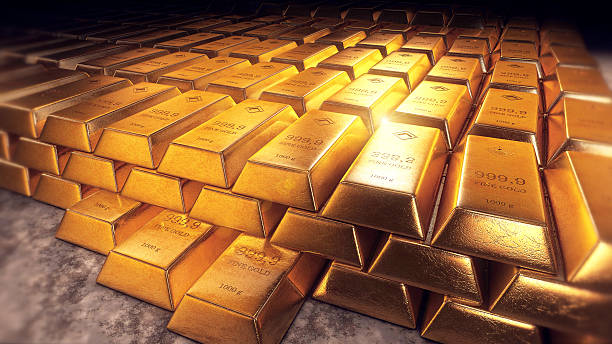 istock Stacked gold bars or bullion with reflections 506512452
