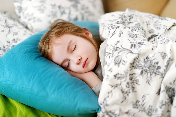 istock Adorable little girl sleeping 506512634