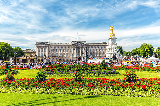 Buckingham Palace, London London, England - August 2, 2015: Buckingham Palace and visitors at summer time. buckingham palace photos stock pictures, royalty-free photos & images