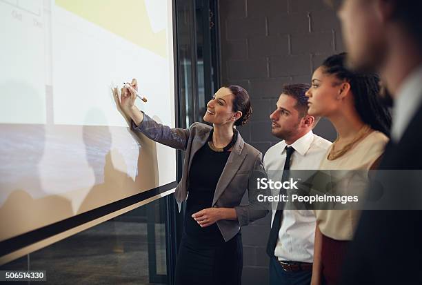 Explaining Her Strategy Stock Photo - Download Image Now - Business, Manager, Presentation - Speech