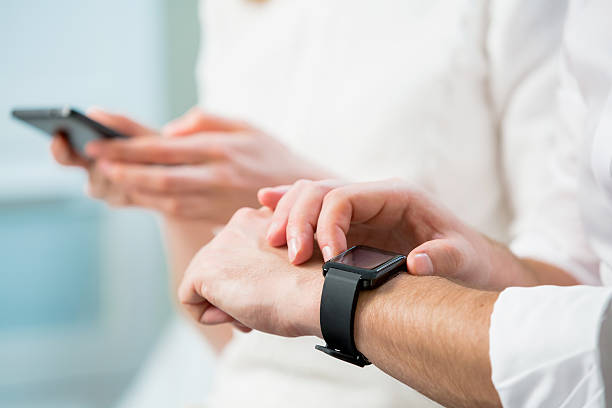 Close up of man hands with smart watch