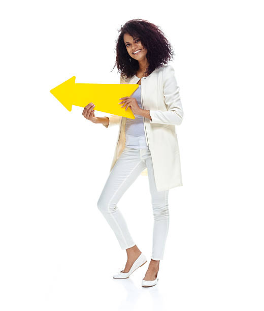 istock Woman showing way 506516786