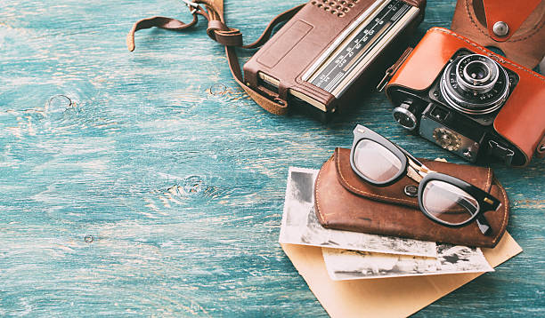 istock Retro glasses and Old retro camera 506518318
