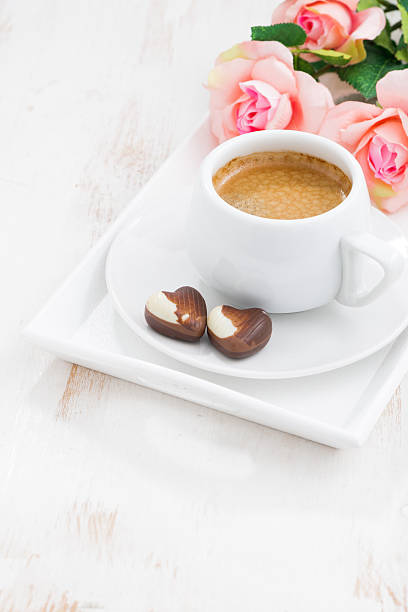 chocolate hearts and cup of espresso for Valentine's Day chocolate hearts and cup of espresso for Valentine's Day, vertical, top view valentine s day holiday stock pictures, royalty-free photos & images