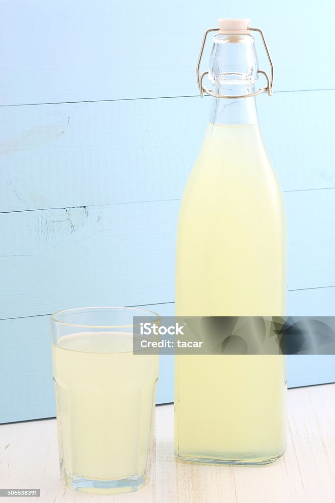 fresh lemonade delicious and nutritious, organic lemonade on vintage bottle and glass Bottle Stock Photo