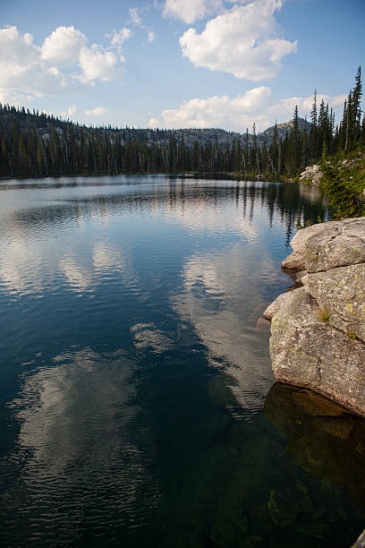 istock Alpine lake on a sunny day in the mountains 506539009