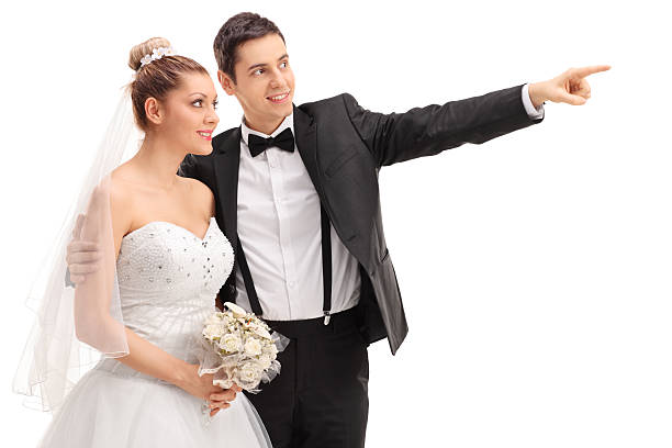 istock Groom showing something to his bride 506541590
