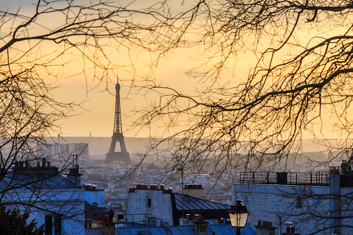 Paris sunset cityscape with the Eiffel tower seen from Montmartre in winter
