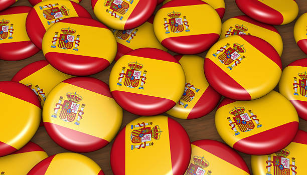 istock Spain Flag Badges Background 506542958