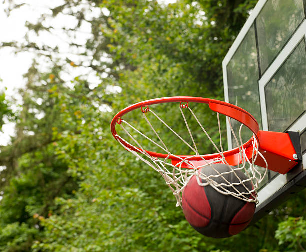 istock Swish - basketball goes through the hoop 506543699