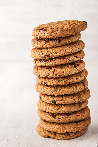 istock Cookies with chocolate chips  on the white table 506543704