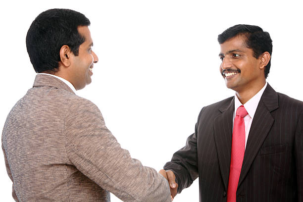 istock Two Indian business people shaking hands 506543746