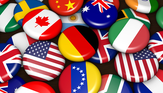 International world flags on scattered buttons badges 3d illustration.