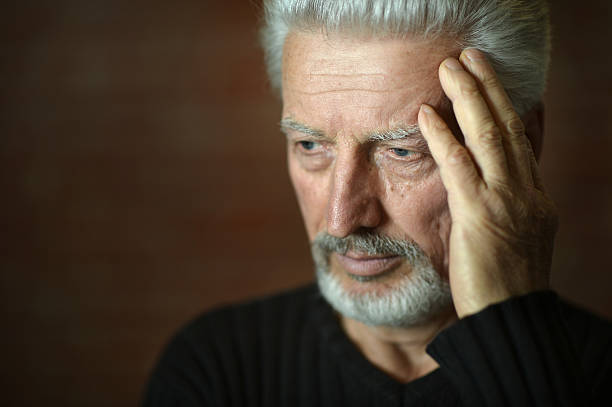 istock Sad senior man at home 506545974
