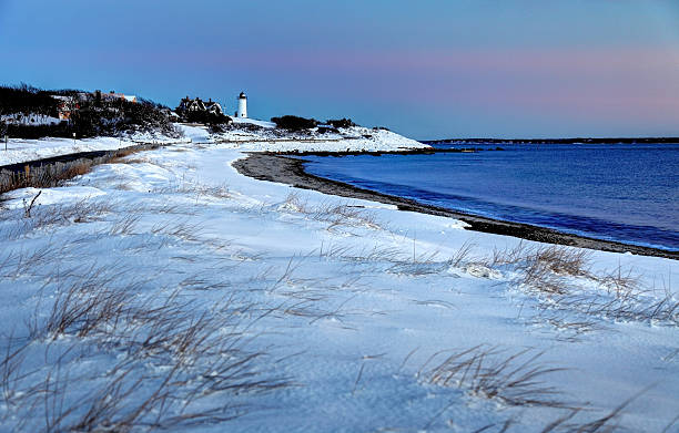 istock Snow Coverd Dunes and the Nobska Lighthouse on Cape Cod 506545996