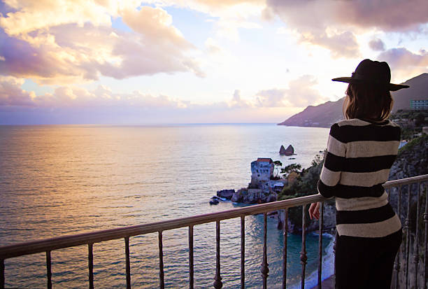 istock Girl with a hat on the terrace 506546322