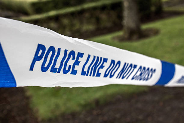istock Police Tape Evidence 506548378