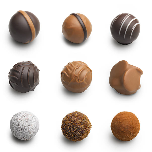 chocolate truffles assortment isolated on white chocolate truffles assortment isolated on white chocolate truffle stock pictures, royalty-free photos & images