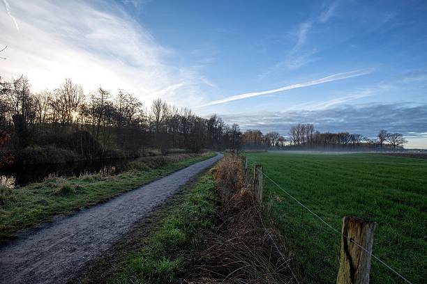 istock Foggy morning landscape 506551318