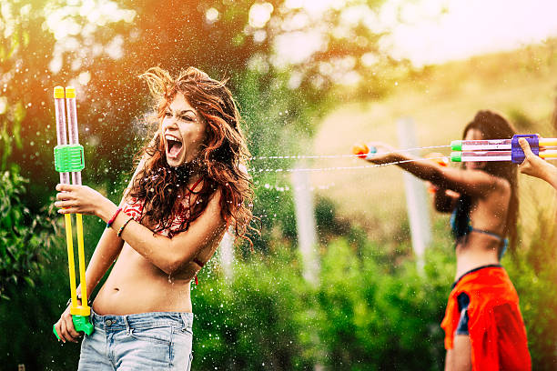 istock Summer and squirt guns fun 506551762