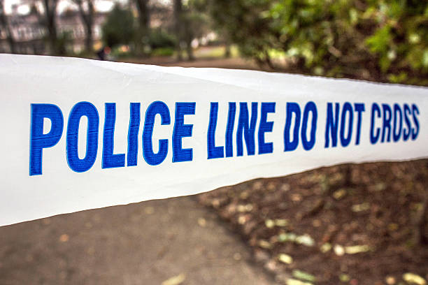 istock Police Tape Evidence 506551810