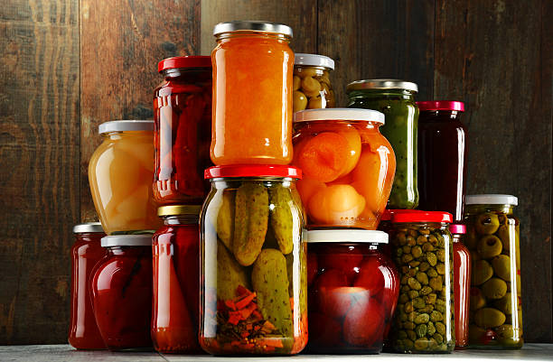 istock Jars with pickled vegetables, fruity compotes and jams 506553512