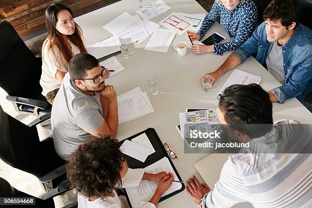 Team Of Creative Professionals Meeting In Conference Room Stock Photo - Download Image Now