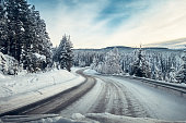Driving on a slippery road in January, Oppland Norway