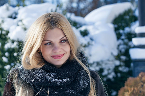 istock Beautiful smiling woman on winter day 506555288