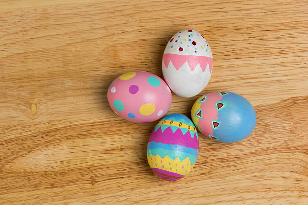 Easter Eggs colorful painted on wood board stock photo