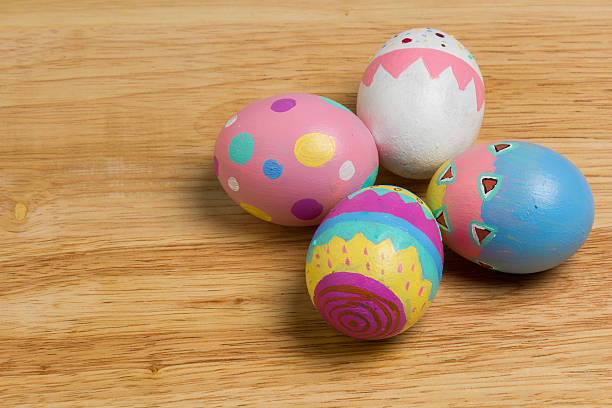 Easter Eggs colorful painted on wood board stock photo