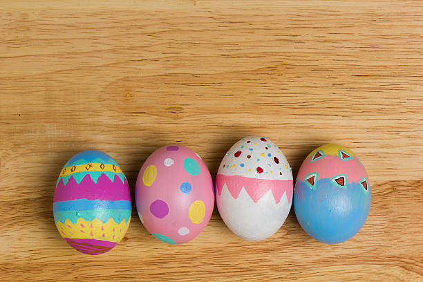 Easter Eggs colorful painted on wood board stock photo