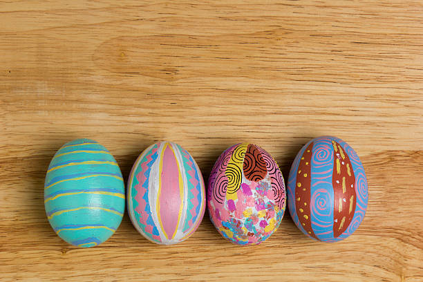 Easter Eggs colorful painted on wood board stock photo