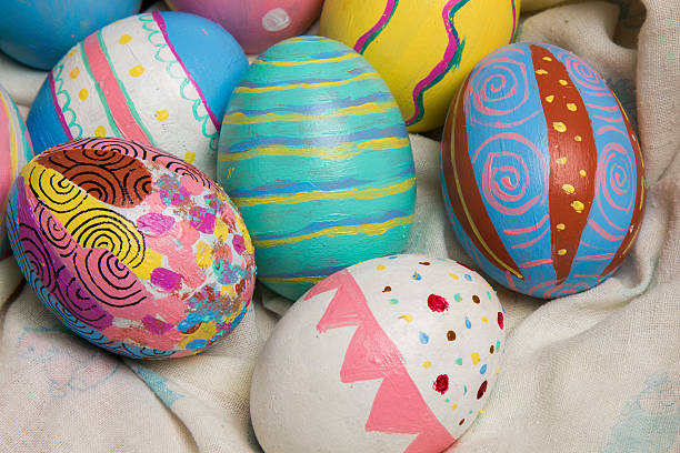 Easter Eggs colorful painted in bamboo basket stock photo