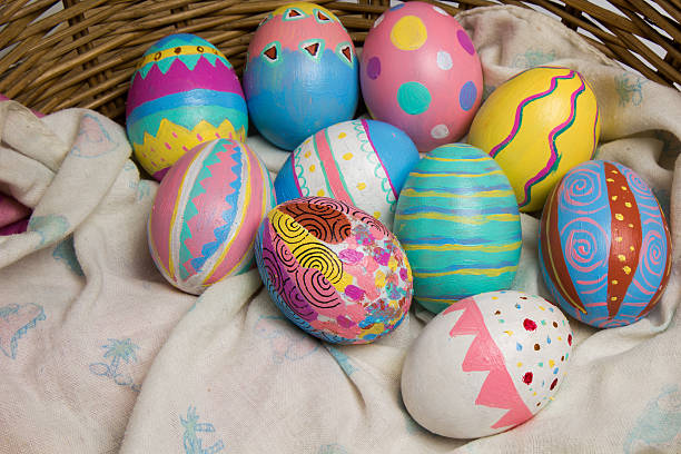istock Easter Eggs colorful painted in bamboo basket 506558460