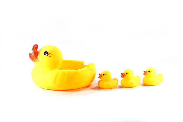 istock Group of rubber ducks yellow next to each other 506573941