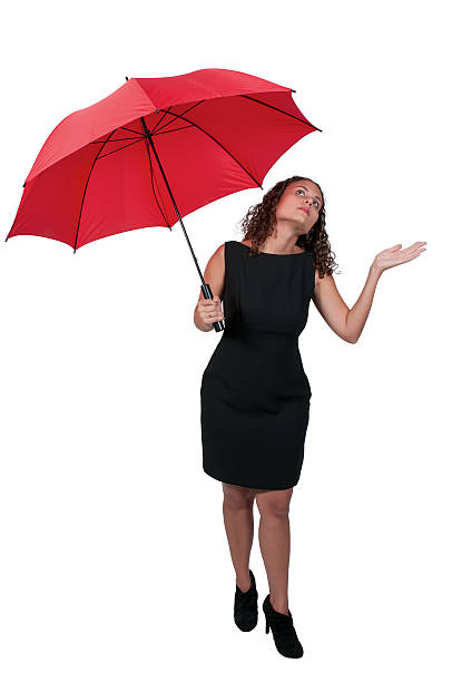 istock Woman Holding Umbrella 506574117