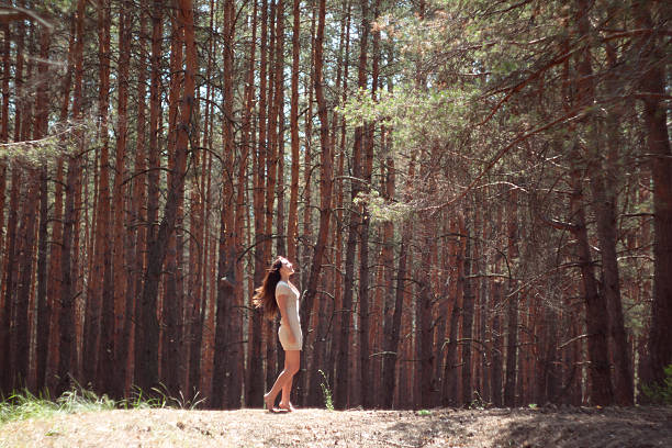 istock Girl in forest 506575063