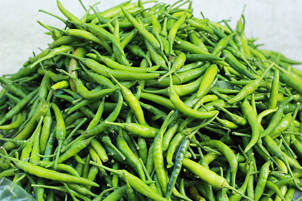 istock green chili in the market 506576041