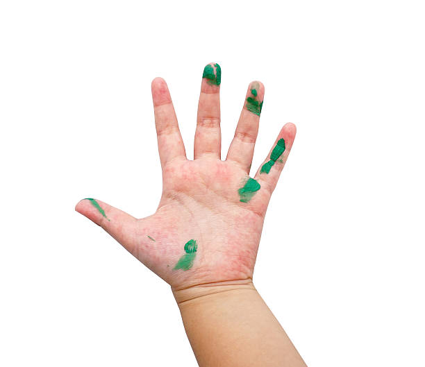 istock painted green on hand on a white background 506576759
