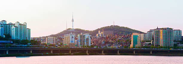 istock Seoul skyline panorama from Han River at sunset 506583428